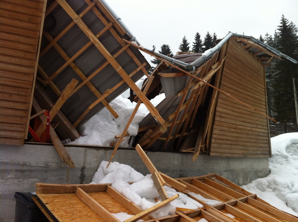 A roof collapses from snow