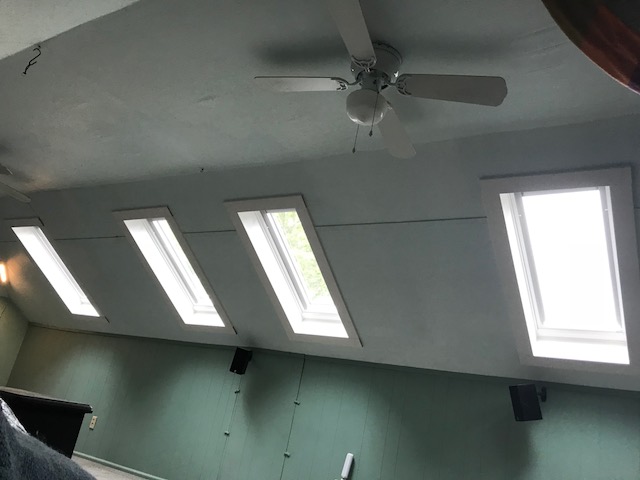 4 solar powered opening skylights with solar powered blinds 4 – Warner Roofing to help illustrate Install Skylight on Existing Roof