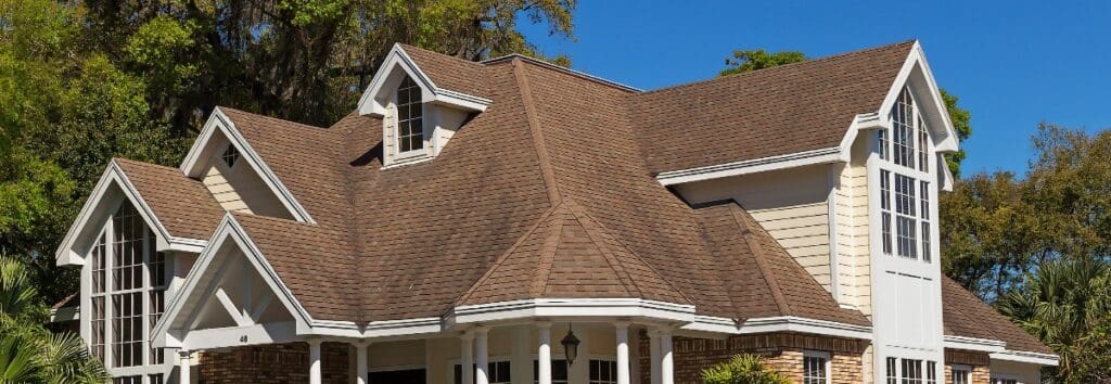 Roof of a lovely 2 story cream-colored home