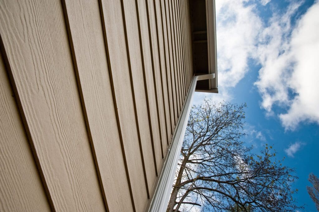 Downspout and siding to illustrate metal roof and siding color combinations