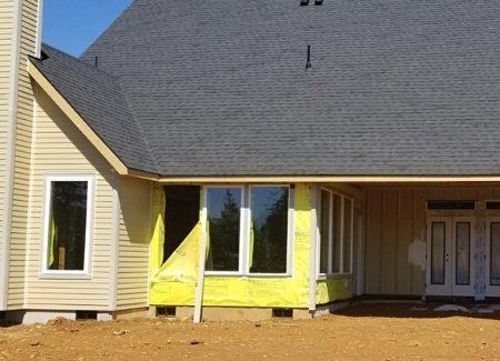 A roof being installed on new construction to illustrate what are composite shingles.