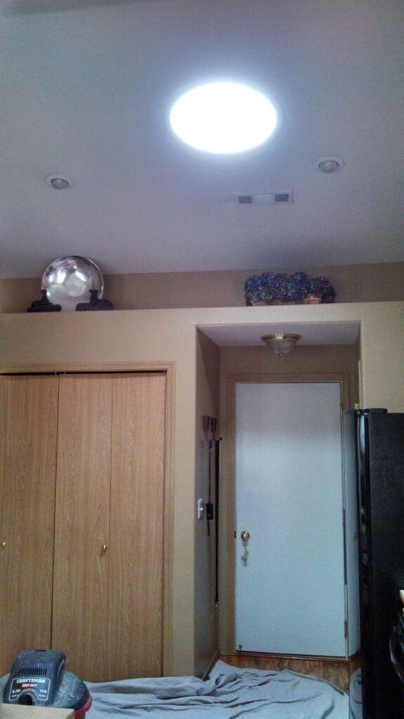 A photo of a an installed bubble skylight viewed from the interior of a residential home