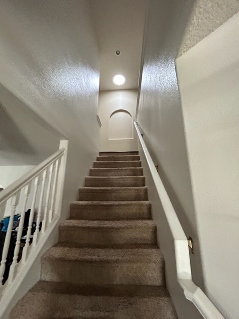 Two story home stairs with solar tube installation project in Camas, WA