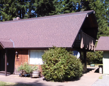 An example of a gambrel roof, with the lower part of the roof being more sloped than the upper part of the roof to illustrate residential types of roofs.