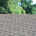 A picture of a new roof with gray shingles to illustrate Is a partial roof replacement a good idea?