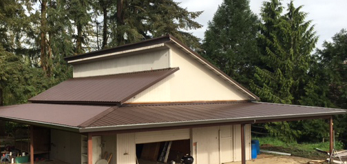 An example of a shed roof with other residential types of roofs mixed in.